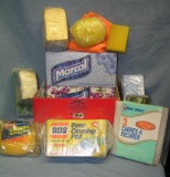 Box full of cleaning pads, sponges and more