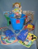Large pail full of vintage and modern children's toys