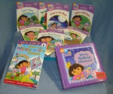 Box full of vintage Dora the Explorer children's books