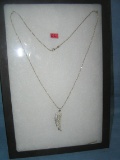 Sterling silver necklace with leaf style charm