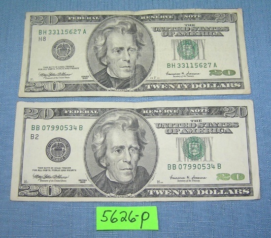 Pair of old style pre color US $20 bills