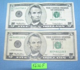 Pair of old style US five dollar bills