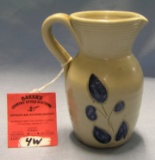 Blue decorated earthenware pitcher