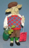 Golfing pig figure