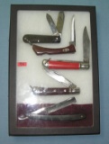 Collection of English made pocket knives and straight razors