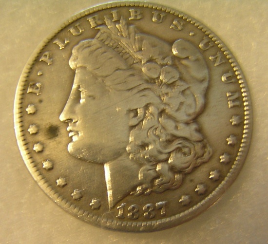 1887O Morgan silver dollar in fine condition