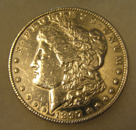 1897 Morgan silver dollar in AU condition
