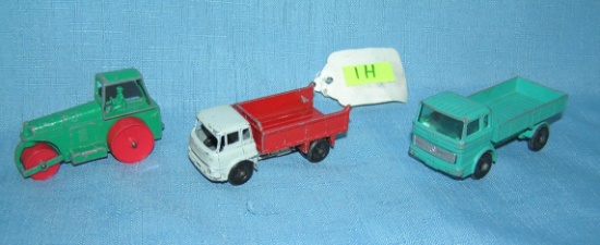 Group of 3 early matchbox toy trucks