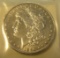 1896 Morgan silver dollar in AU condition