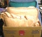 Box full of vintage pillows