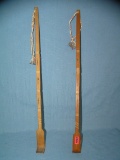 Pair of carved wooden souvenir back scratchers