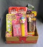 Box full of vintage PEZ candy containers