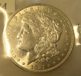 1921D Morgan silver dollar in AU condition