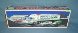 Vintage HESS toy truck and race cars
