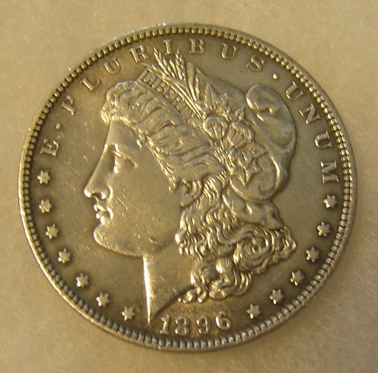 1896 Morgan silver dollar in AU condition