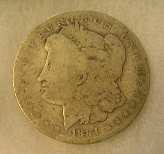 1884-O Morgan silver dollar in fair condition