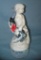 Hand painted cement nautical child and dolphin figure