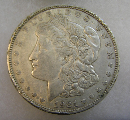 1921D Morgan silver dollar in very good condition