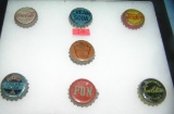 Group of antique soda caps