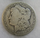 1885-O Morgan silver dollar in fair condition