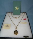 Gold toned Blessed Mother necklace with locket