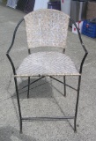 Wrought iron and wicker chair