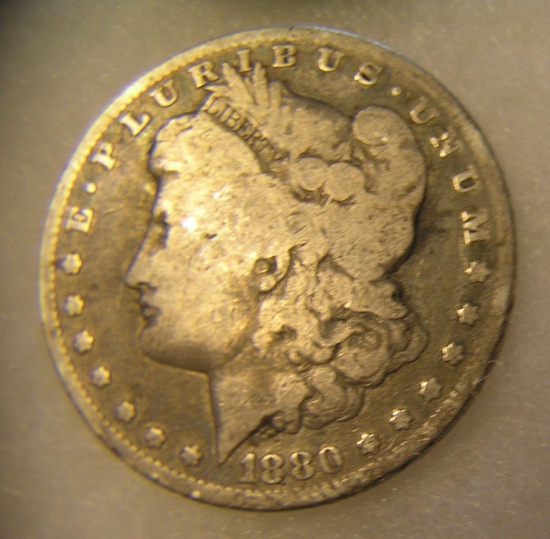 1880-O Morgan silver dollar in good condition
