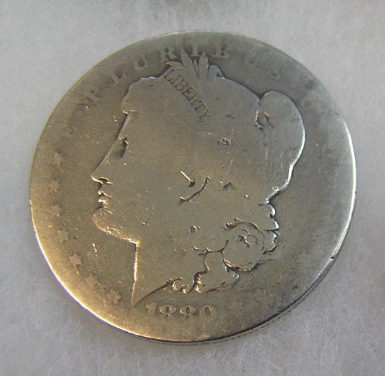 1880-O Morgan silver dollar in fair condition