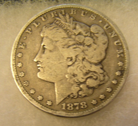 1878S Morgan silver dollar in very good condition