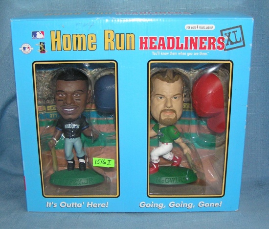 K. Griffey Jr. and M. McGwire bobble head dolls