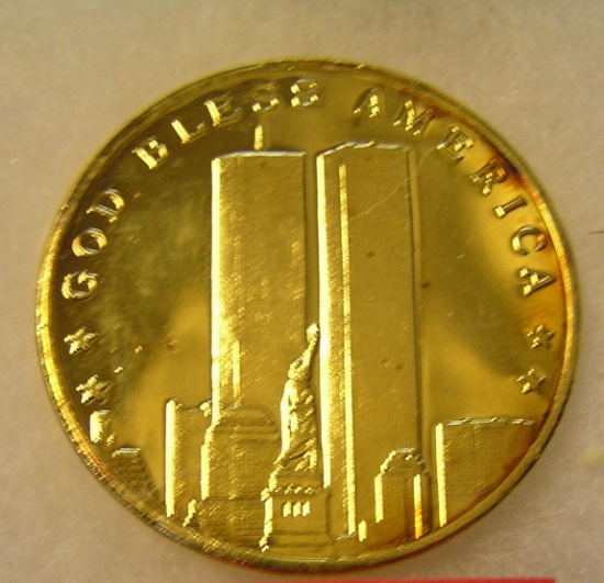 Gold tone 1 ounce pure silver Twin Towers coin