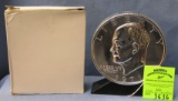 Vintage cast metal Eisenhower dollar coin bank