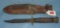 WWII military fighting knife with scabbard and knife sharpener