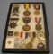 Group of antique medals, badges, and awards