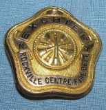 Early golf filled diamond encrusted ex-fire chief's badge