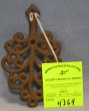 Antique cast iron trivet