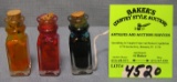 Group of four miniature perfume bottles