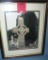 Matted and framed religious photo