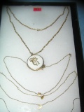Collection of gold plated costume jewelry necklaces