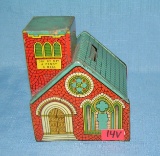 Antique tin church bank by J. Chein and Co.