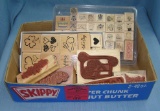 Box full of craft and decorative rubber stamps