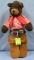 Early western dressed bear doll