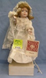 Vintage porcelain musical bride doll