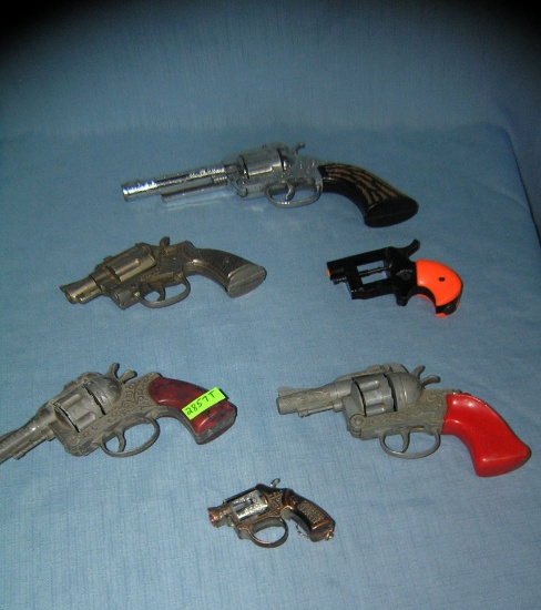 Collection of 6 all cast metal vintage cap guns