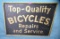 Top quality bicycles repairs and service retro sign