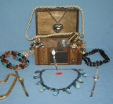 Box full of vintage costume jewelry