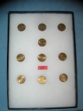 Collection of solid brass US state commemoratives