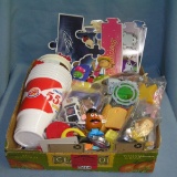 Box full of vintage fast food collectible toys