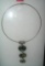 Costume jewelry necklace with abalone type stone