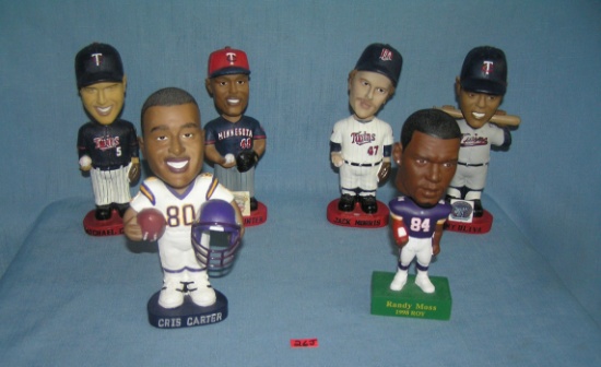 Minnesota Twins and Vikings bobble head figures